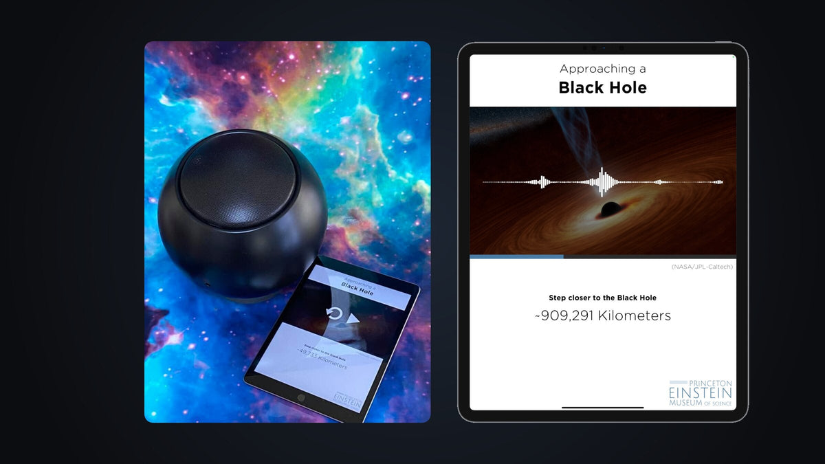 The Approaching a Black Hole prototype: a black spherical speaker beside an iPad running the app