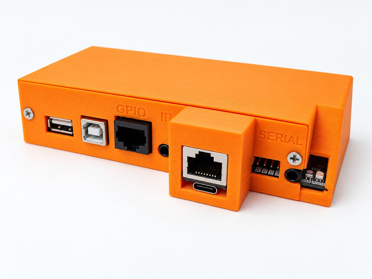 The custom IO bridge for BrightSign: an orange enclosure with USB, GPIO, IR, Ethernet, USB-C, and serial ports on the front