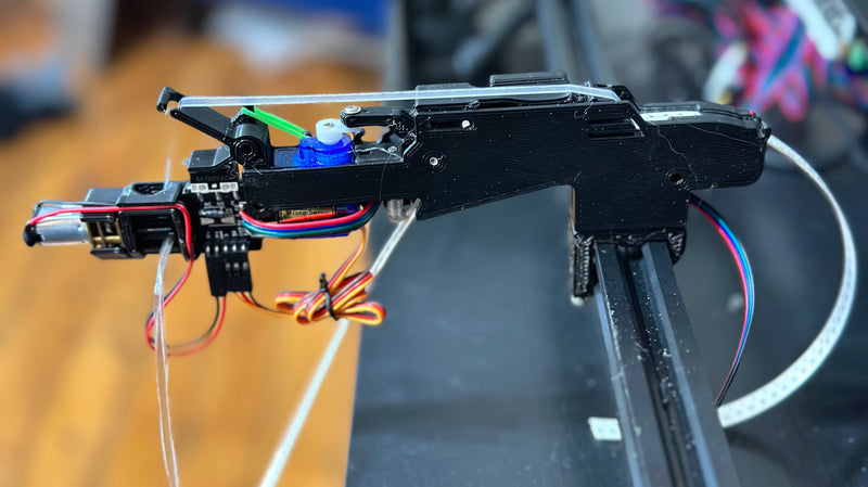 Max Feeder mounted on a pick-and-place machine, advancing a strip of component tape